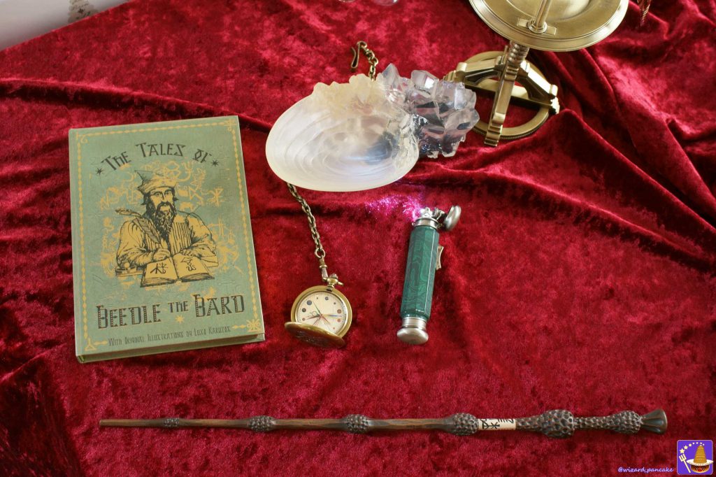 Crystal goblets and items associated with Dumbledore.
