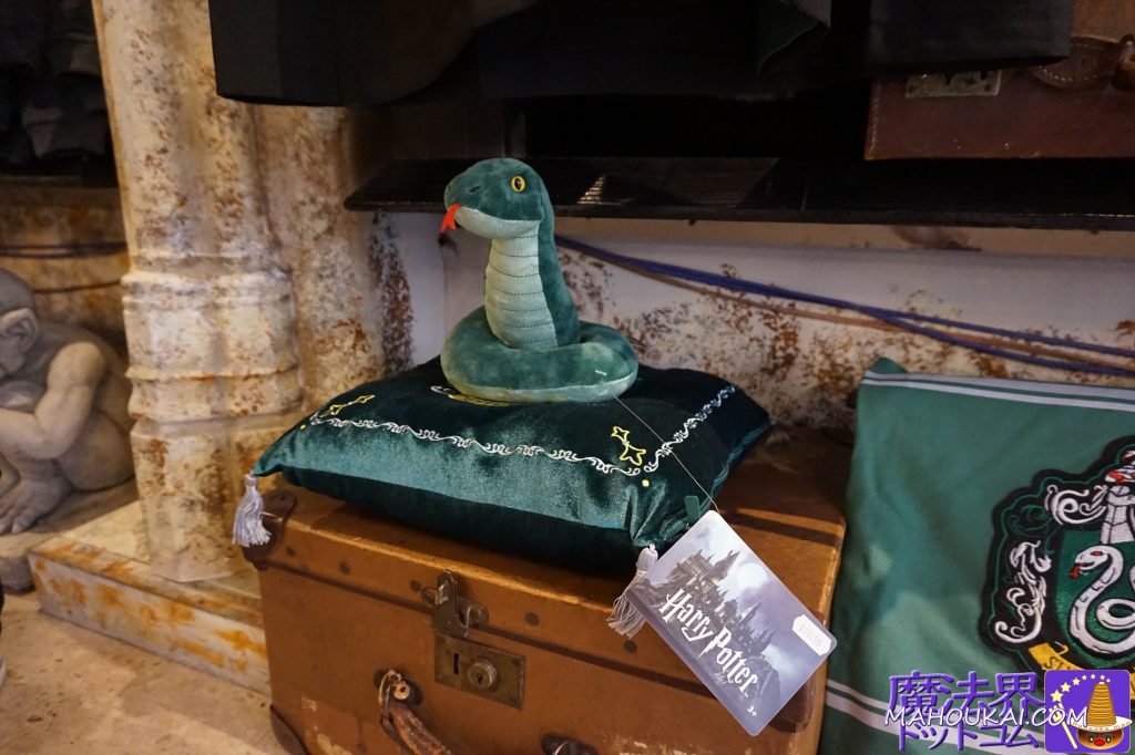 Snake of Slytherin mascot with cushion New shop for Harry Potter merchandise! House of Spells, London/UK.