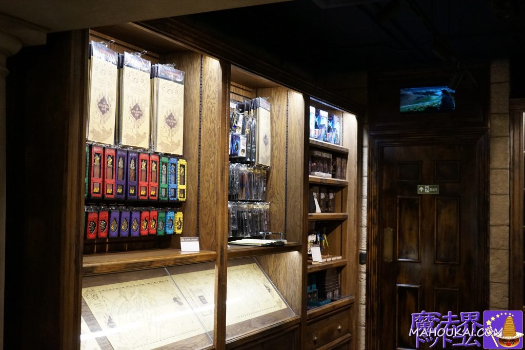 Four Dormitories merchandise and The Map of the Ninja on full display The Noble Collection Covent Garden Shop, Harry Potter replica merchandise, London.