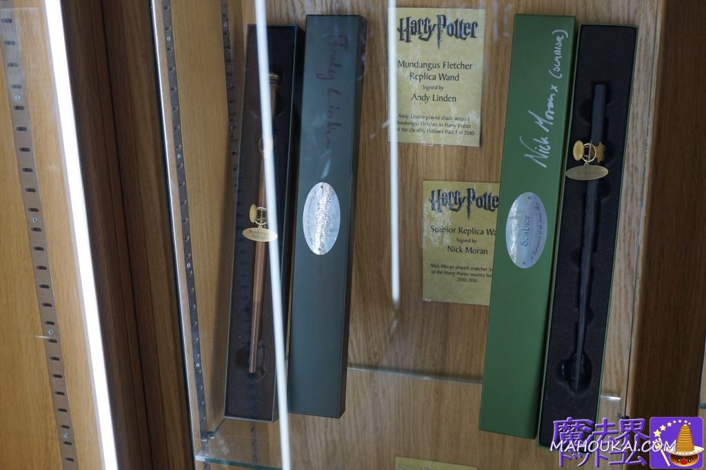 Mundungus Fletcher wand: signed Andy Linden, Scabior wand: signed Nick Moran The Noble Collection Covent Garden Shop, Harry Potter replica merchandise, London.