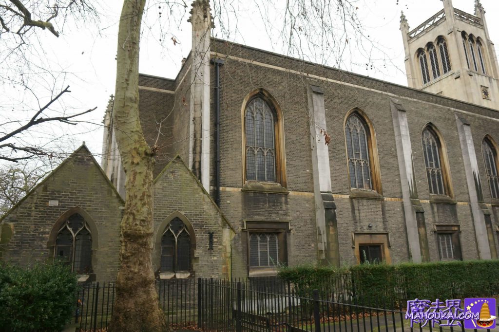 Historic buildings in London with old churches that look like they could be in a film.