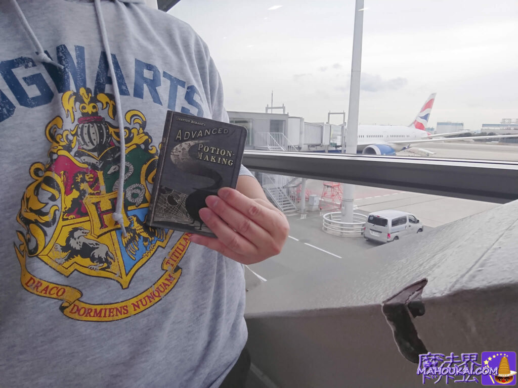USJ Harry Potter merchandise passport case with Hogwarts hoodie and Potions textbook design Kansai Airport UK Harry Potter travel